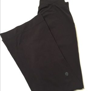 Lululemon “Still” pocketed yoga pants in black.